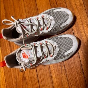 Nike Kids Gray and White Sneakers with Orange Accents